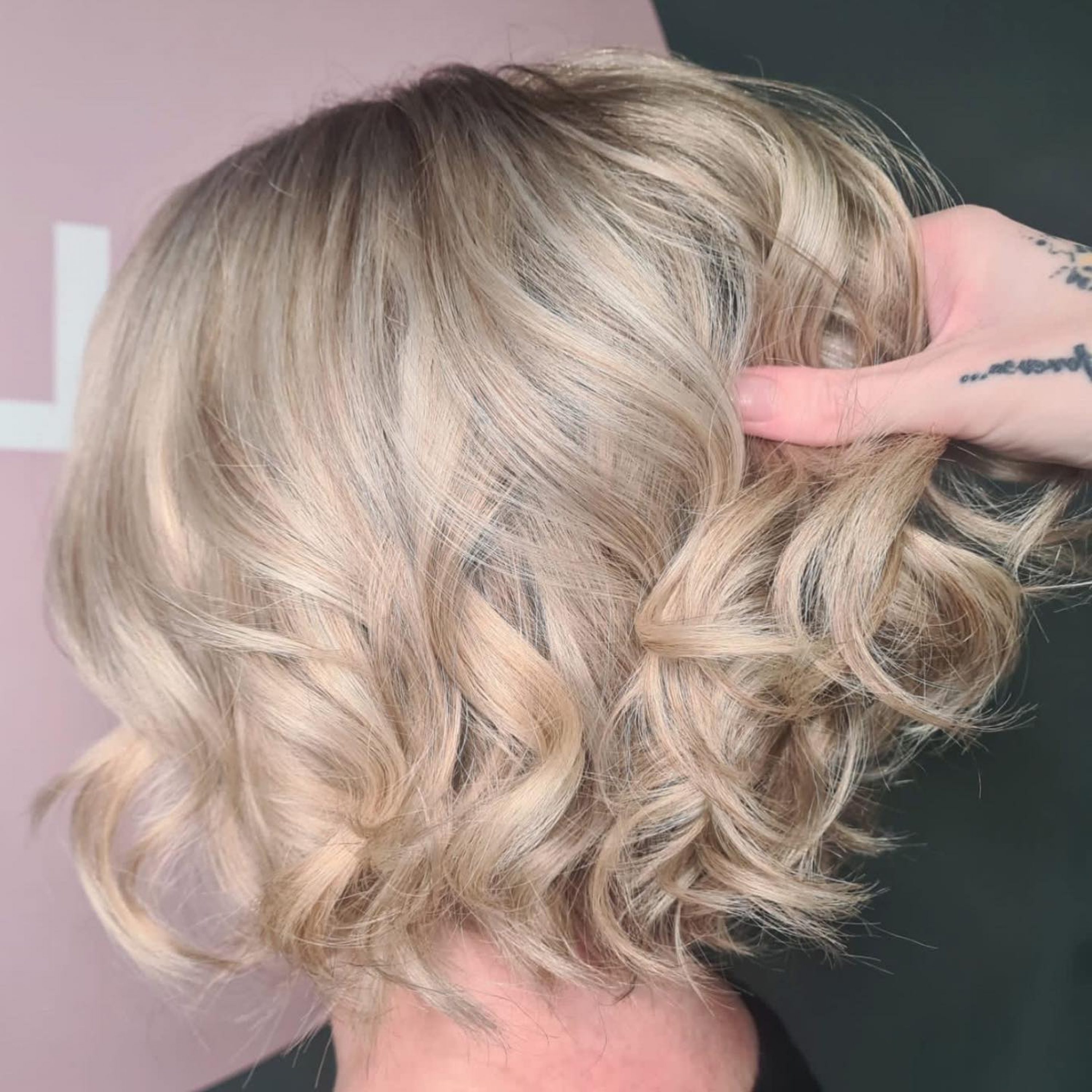 blonde bob haircut with curls