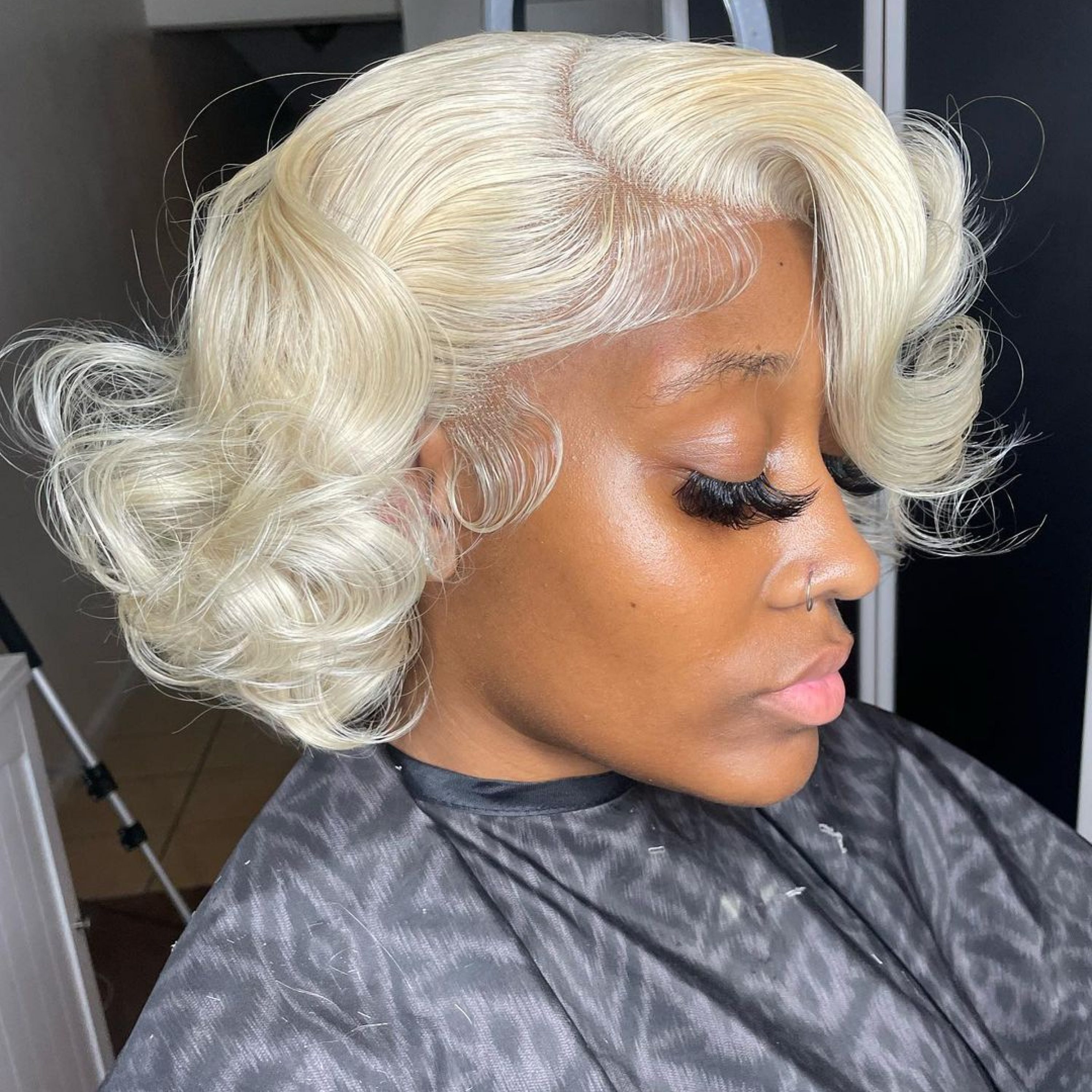 undone short blonde bob with curls