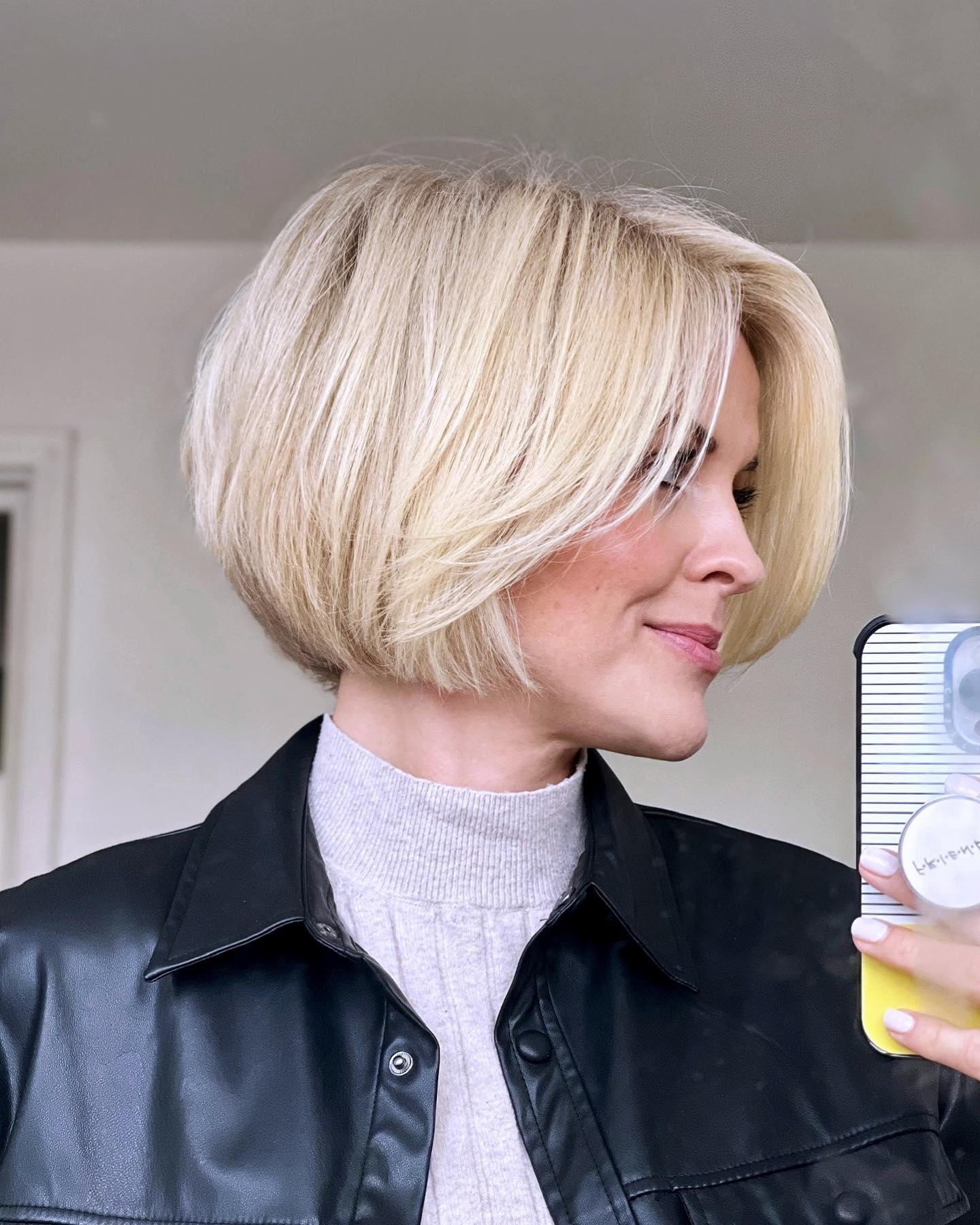 stacked platinum blonde bob