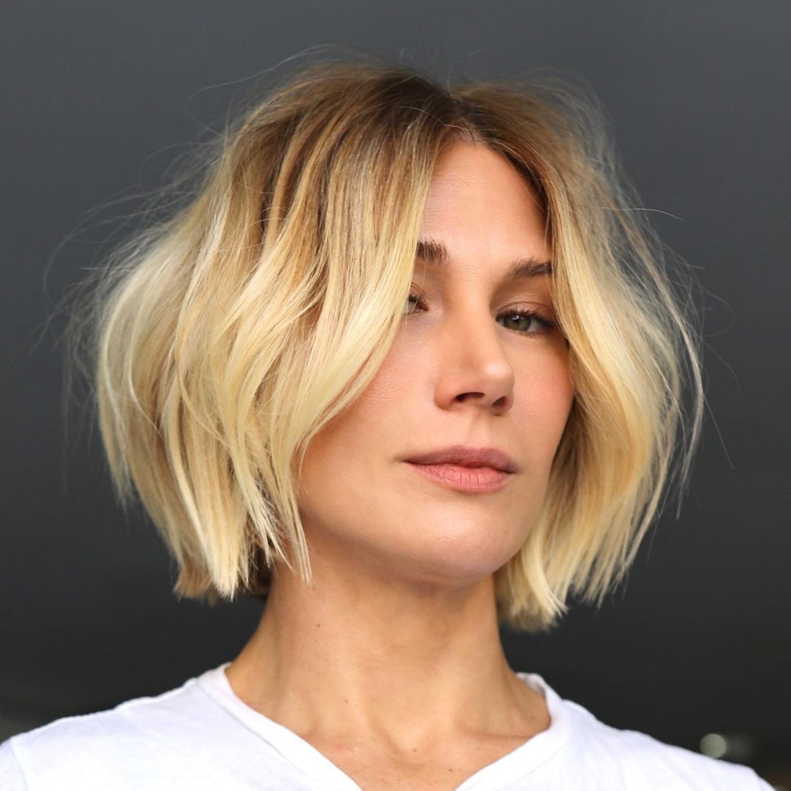 short blonde bob haircut with root tap