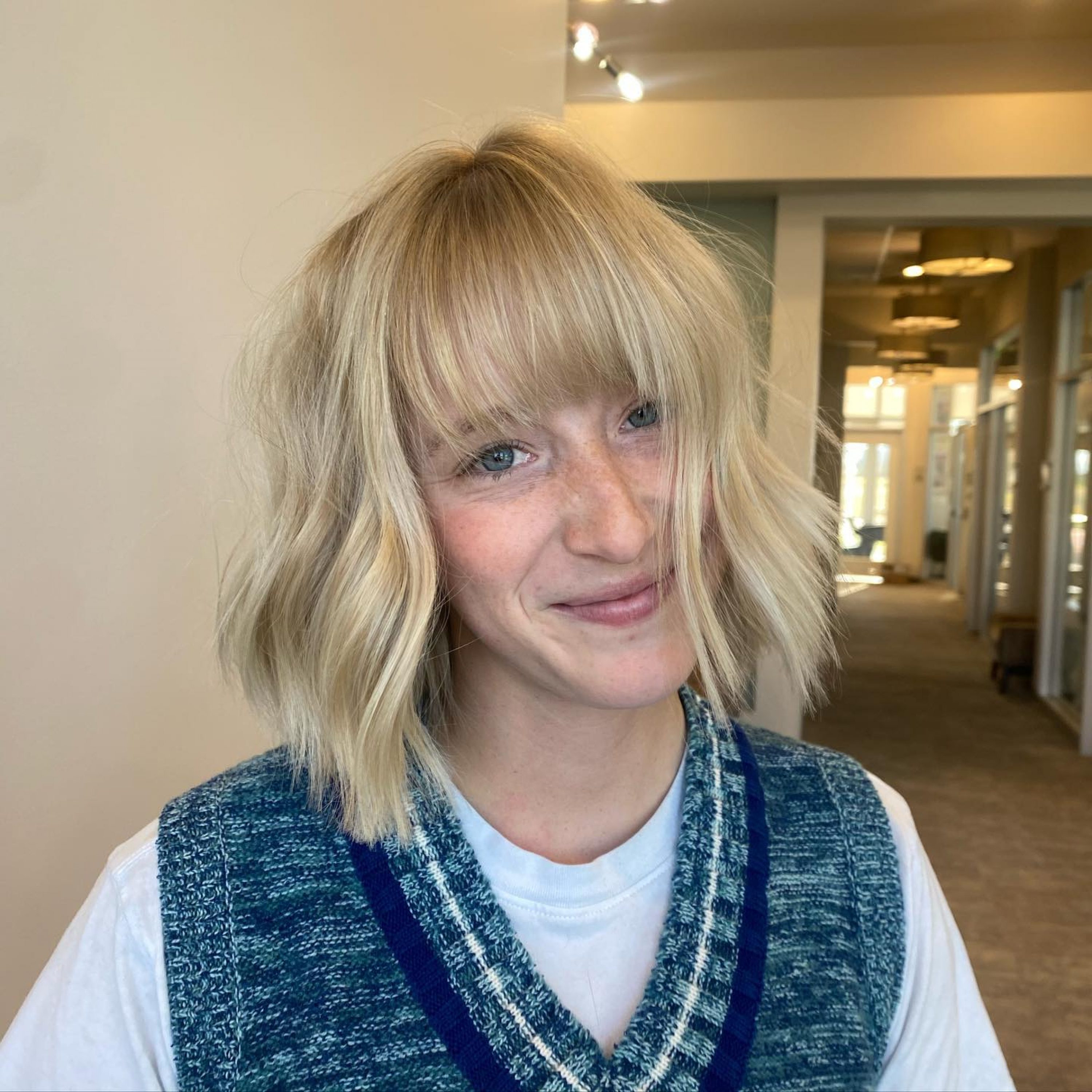 blonde bob with bangs