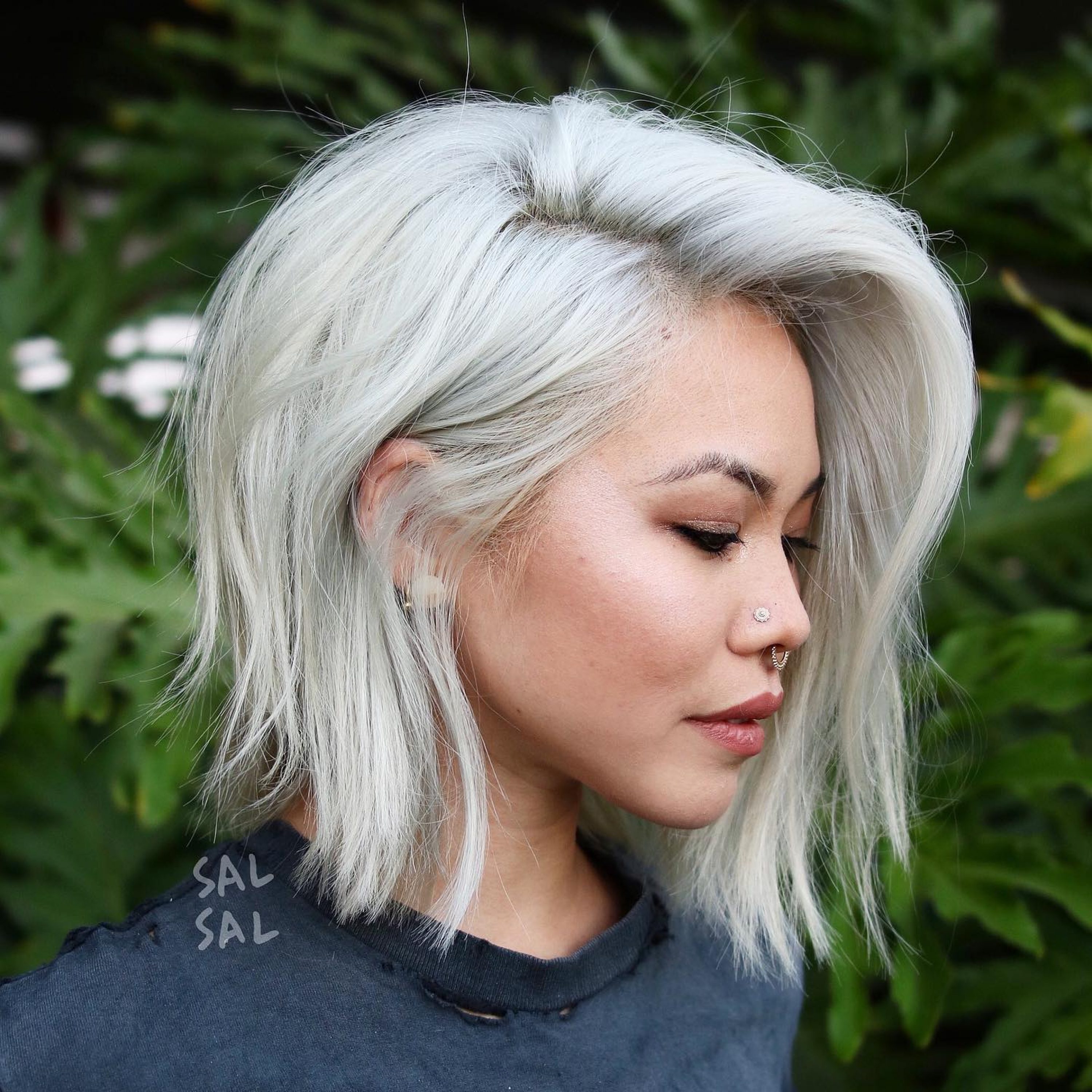 platinum blonde bob with long bangs