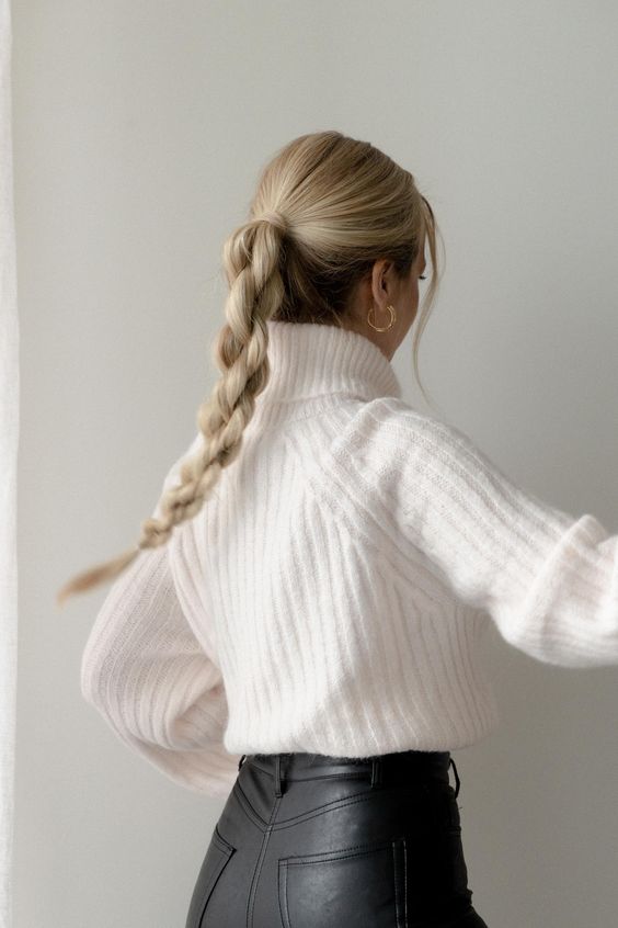 a creatively woven braid with a sleek top and face-framing hair is a cool idea for a holiday party