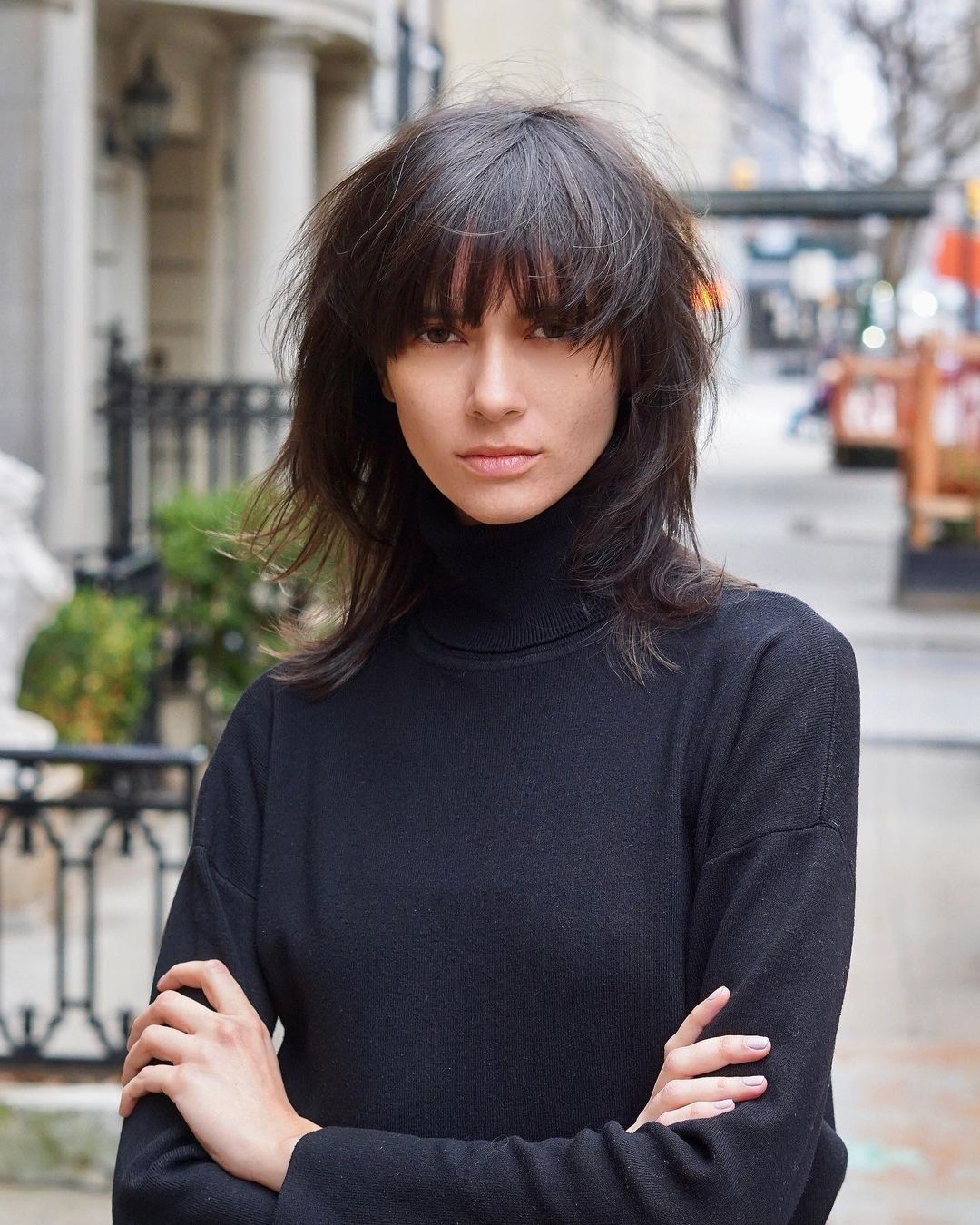 shoulder-length hair with full fringe