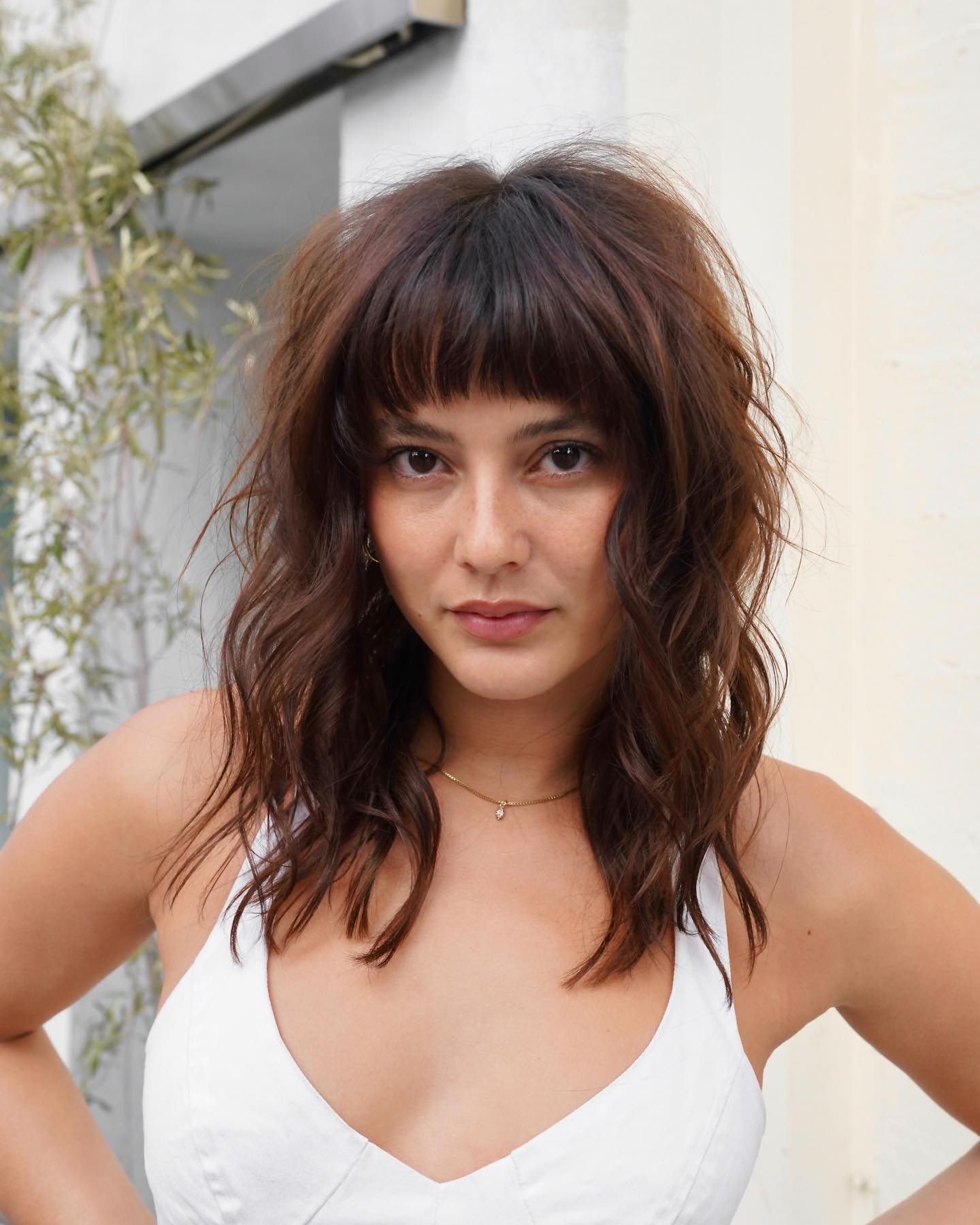 mid-length hair with full fringe