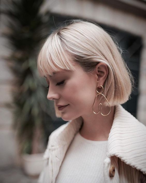 a cool short blonde bob with classic bangs always works, this is an absolutely timeless idea