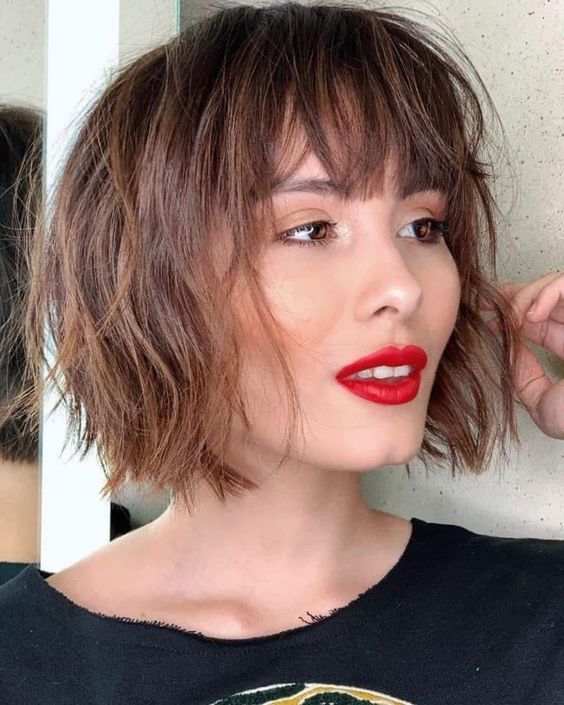 a messy and textural short brunette bob with layers and fringe is a fantastic idea if you want a bit of rock