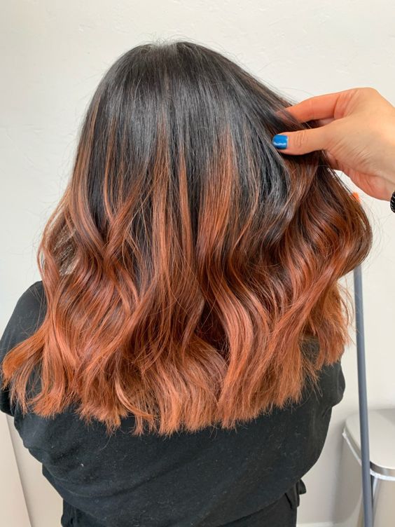 medium-length hair from black to copper, with volume and waves, is a lovely idea