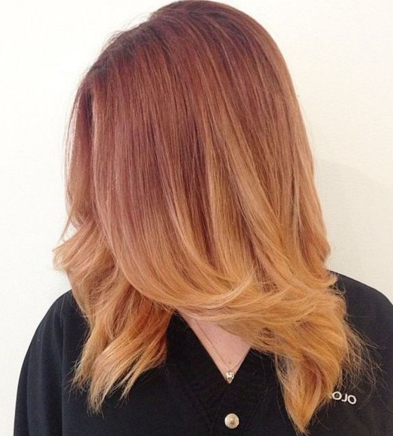 ombre auburn strawberry blonde hair with a cascade for a bright and cool look