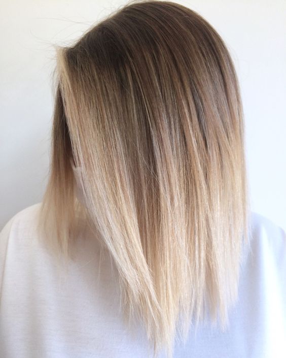 pretty medium-length hair with an ombre effect from brunette to bleached blonde is a lovely idea