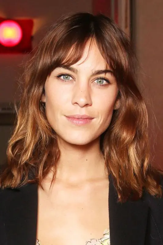 a lovely auburn long bob with copper and caramel balayage, bottleneck bangs and waves is a lovely and bright idea