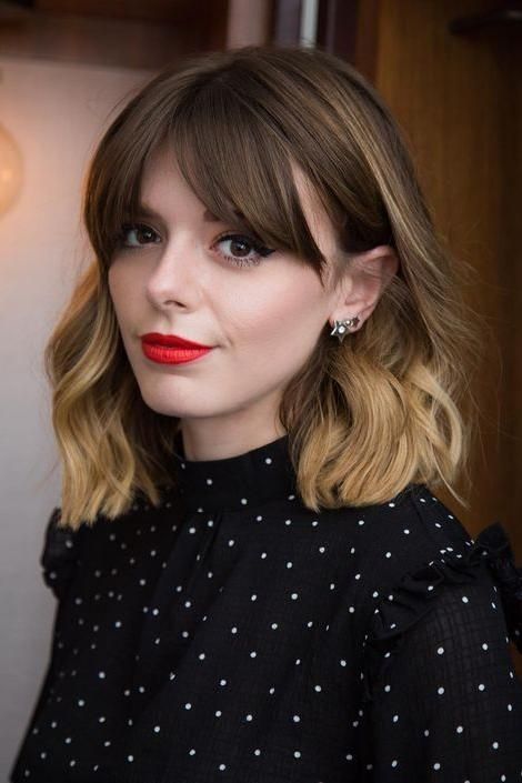 a gorgeous light brunette long bob with blonde balayage and ends, with elegant side bangs for a super cute and girlish look