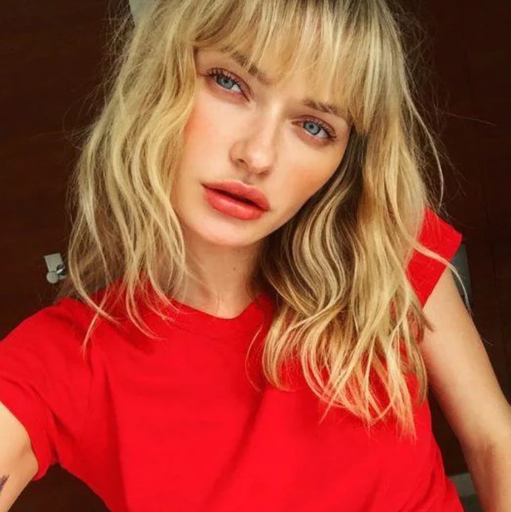 bangs are so popular right now and if you opt to pair them with a shaggy long bob haircut, your look will be taken to the next level