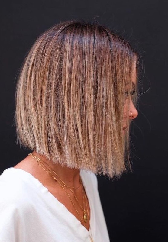 a chic blunt bob with a brown root and blonde balayage is a beautiful and catchy idea to try right now