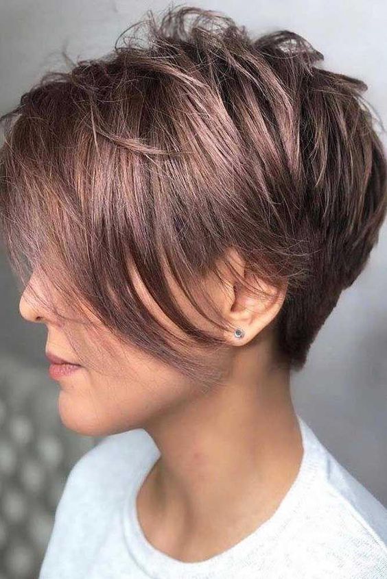 a shiny mauve pixie haircut with a long fringe is a cool and chic idea to rock, it looks bold yet its soft shade makes it more subtle