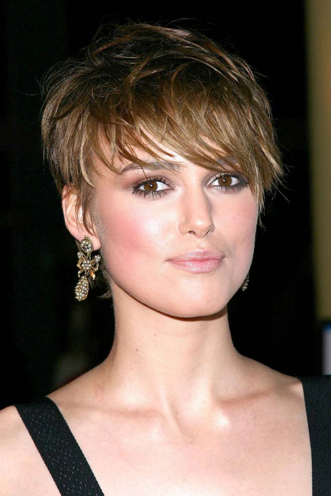 Keira Knightley wearing a choppy long pixie that looks bold, distinctive and face-flattering and inspires