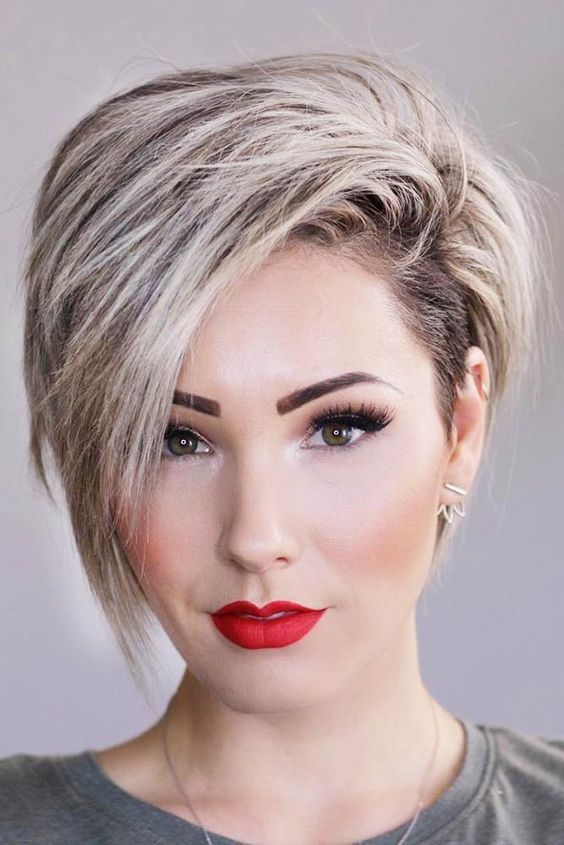 an asymmetric blonde long pixie haircut looks gorgeous and very daring