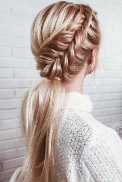 a low ponytail with a large side braid on top and a bump is a beautiful hairstyle that will fit many occasions