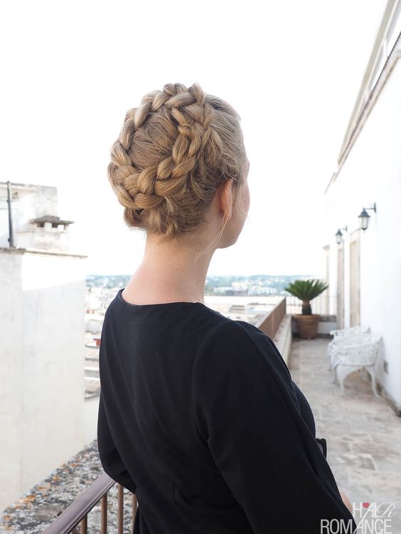 a lovely Christmas updo with a large and volumetric braided halo is a cool and chic idea for the holidays