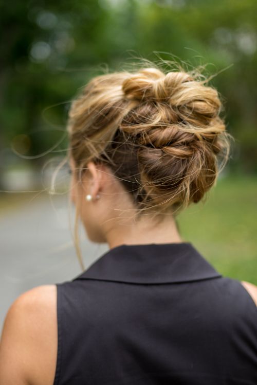 a messy twisted low updo with a volumetric top and some locks down is always a pretty and cool solution for the holidays