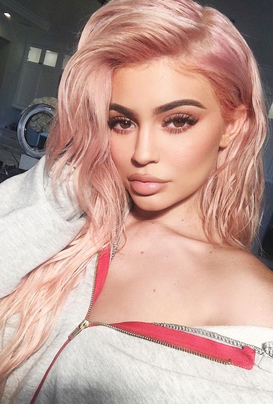 Kylie Jenner wearing strawberry blonde on long hair with texture looks super cute and lovely