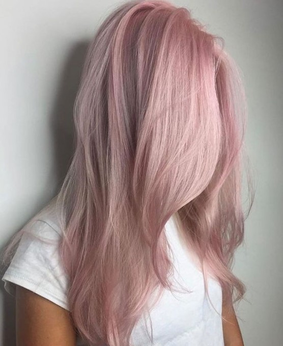 long wavy hair with a delicate pale pink shade and some layers is a lovely idea for any girl who loves pastels