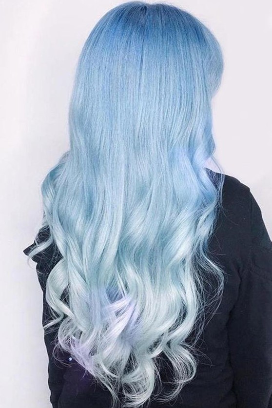 pastel blue to aqua and silver hair with waves is a stylish and chic idea for anyone who loves such colors