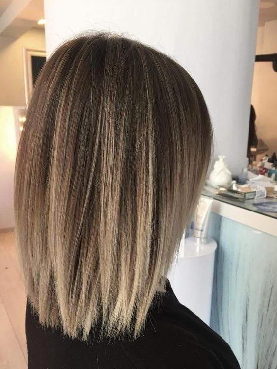 a brunette long bob with blonde highlights all over is a lovely idea to rock, it looks cool and bold thanks to the highlights