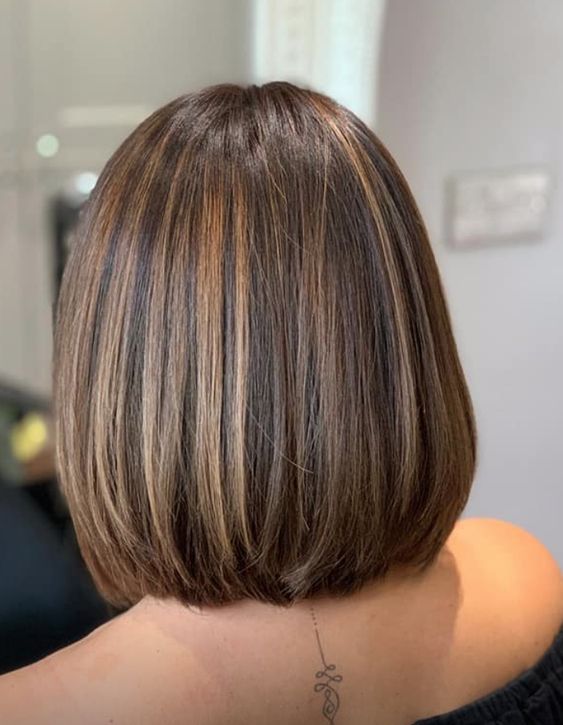 a stylish dark brunette long bob with caramel highlights is a catchy and lovely idea for a modern and fresh look