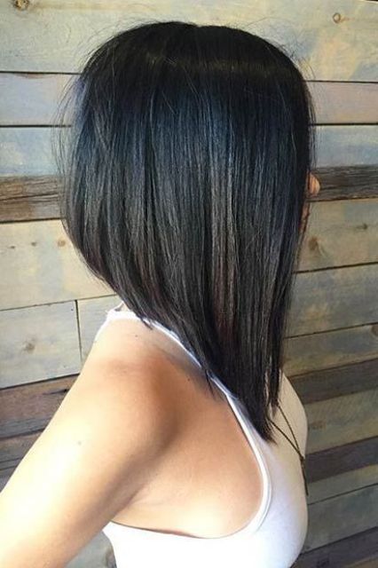 an angled long black bob with a bit of ombre touch is a stylish and bold idea, and geometry will catch an eye