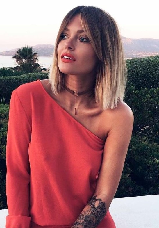 a bold ombre brown to icy blonde shoulder-length bob with short curtain bangs is an amazing idea to rock