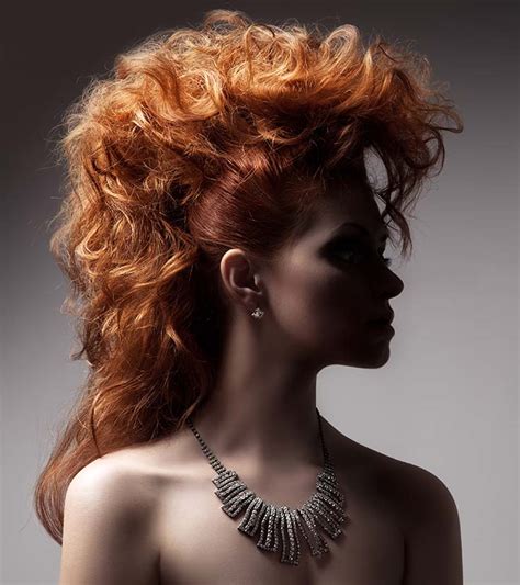 Fiery Red Voluminous Curls 80s hairstyles